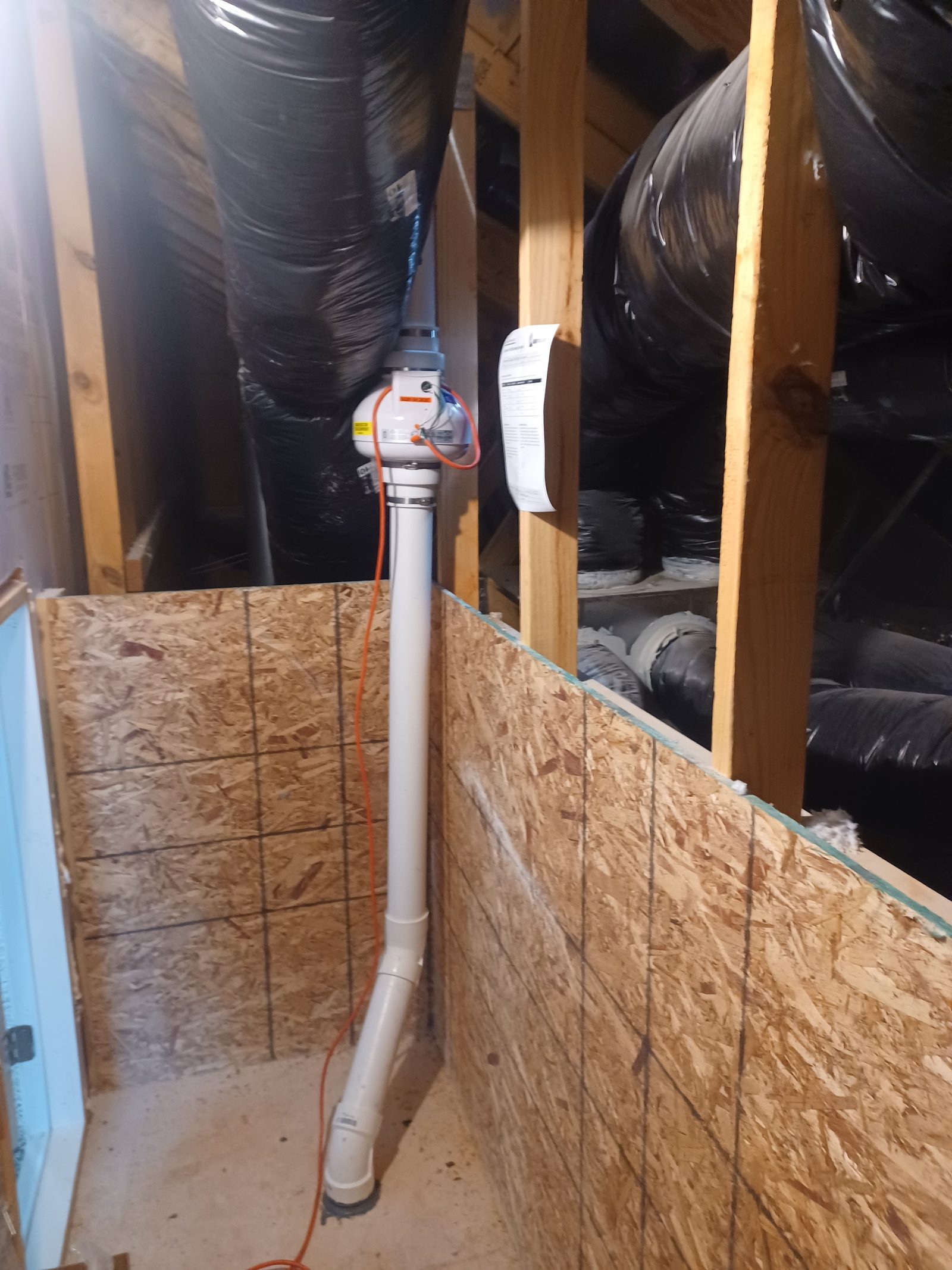 Radon fan mounted in an attic